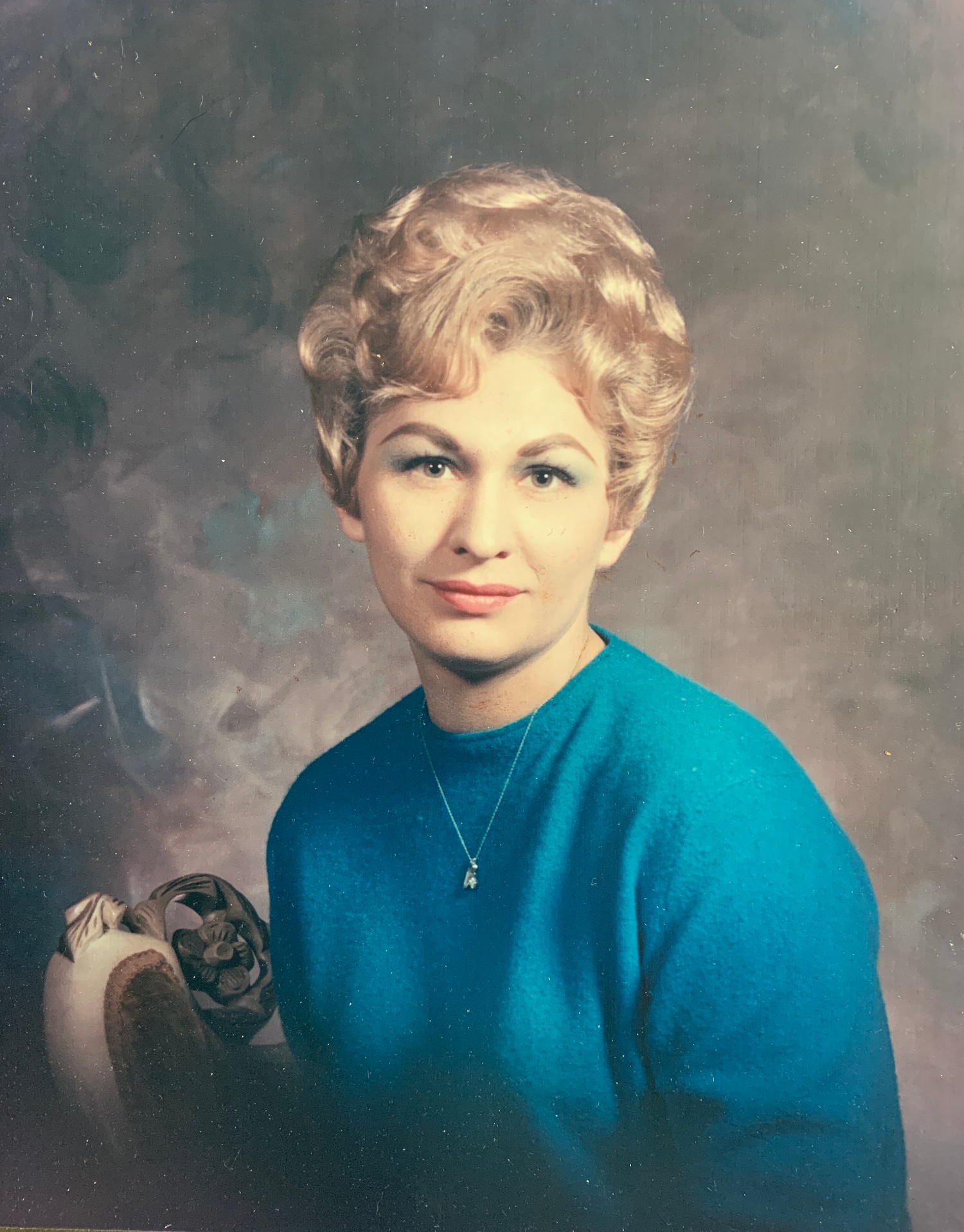 Gertie Mae (Unthank) Smith, a portrait in her turquoise sweater
